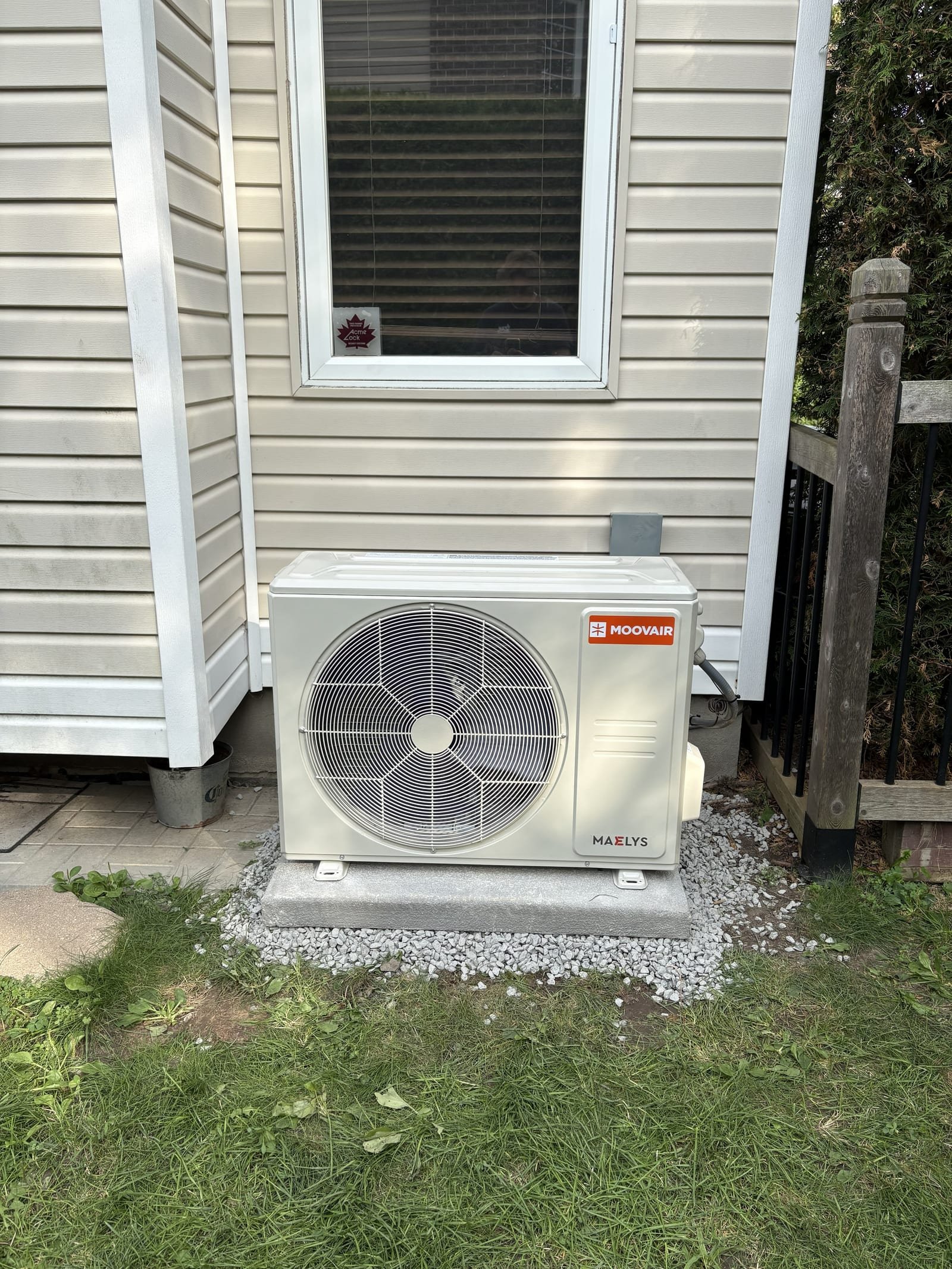 Moovair outdoor unit installed beside a home